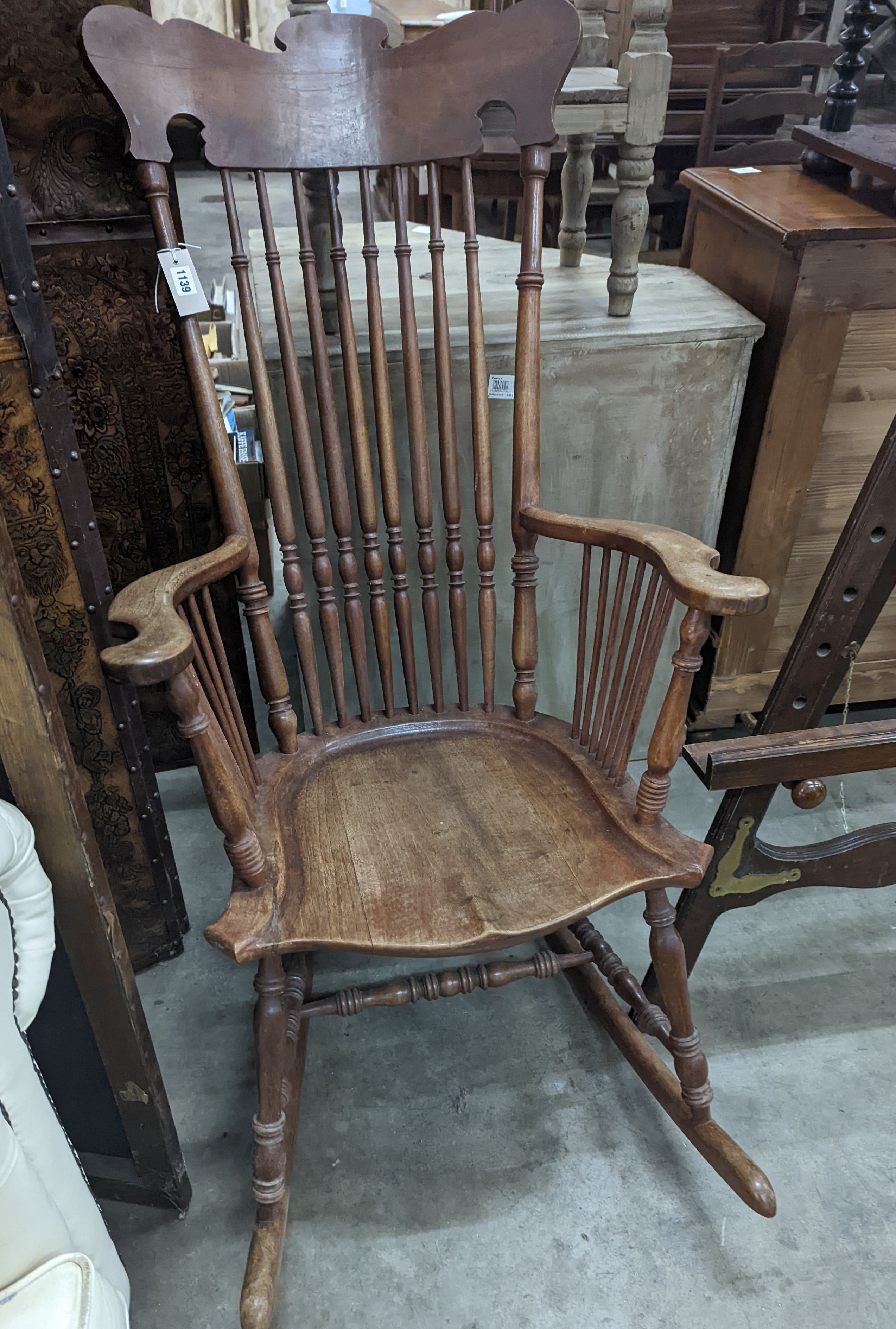 A rocking chair, width 64cm, depth 50cm, height 120cm